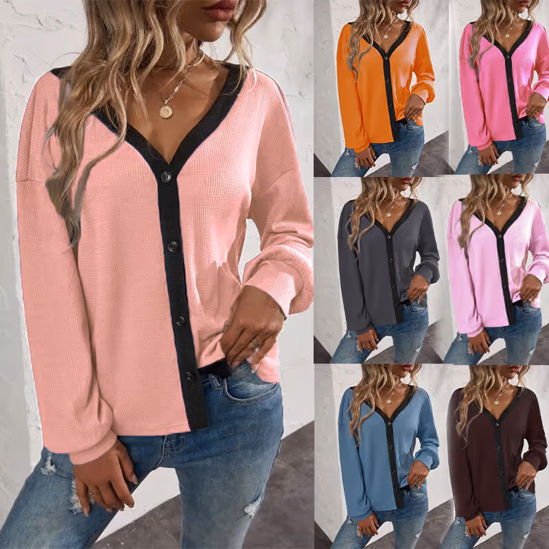 Model wearing minimalist long sleeve top
